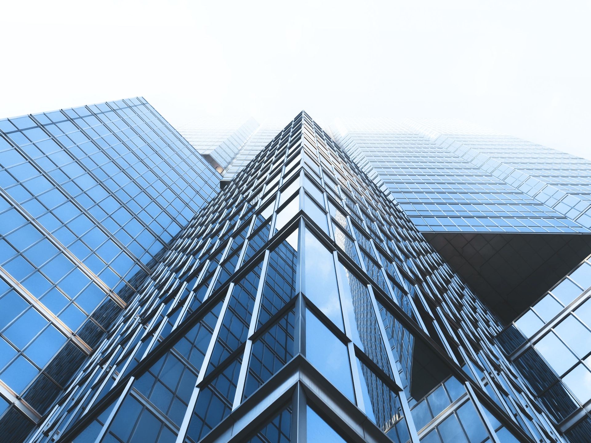 low angle photography curtain wall buildings